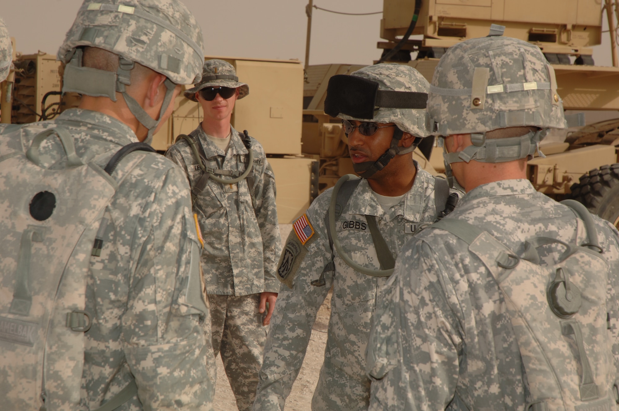 Army Sgt. Dawayn Gibbs, 3/43rd Air Defense Artillery (second from right), prepares his Soldiers to replace a Patriot missile. The 3/43rd ADA provides  defense of the base’s critical assets and forces against aircraft, cruise missiles and tactical ballistic missiles. (U.S. Air Force photo by Master Sgt. Ken Stephens)