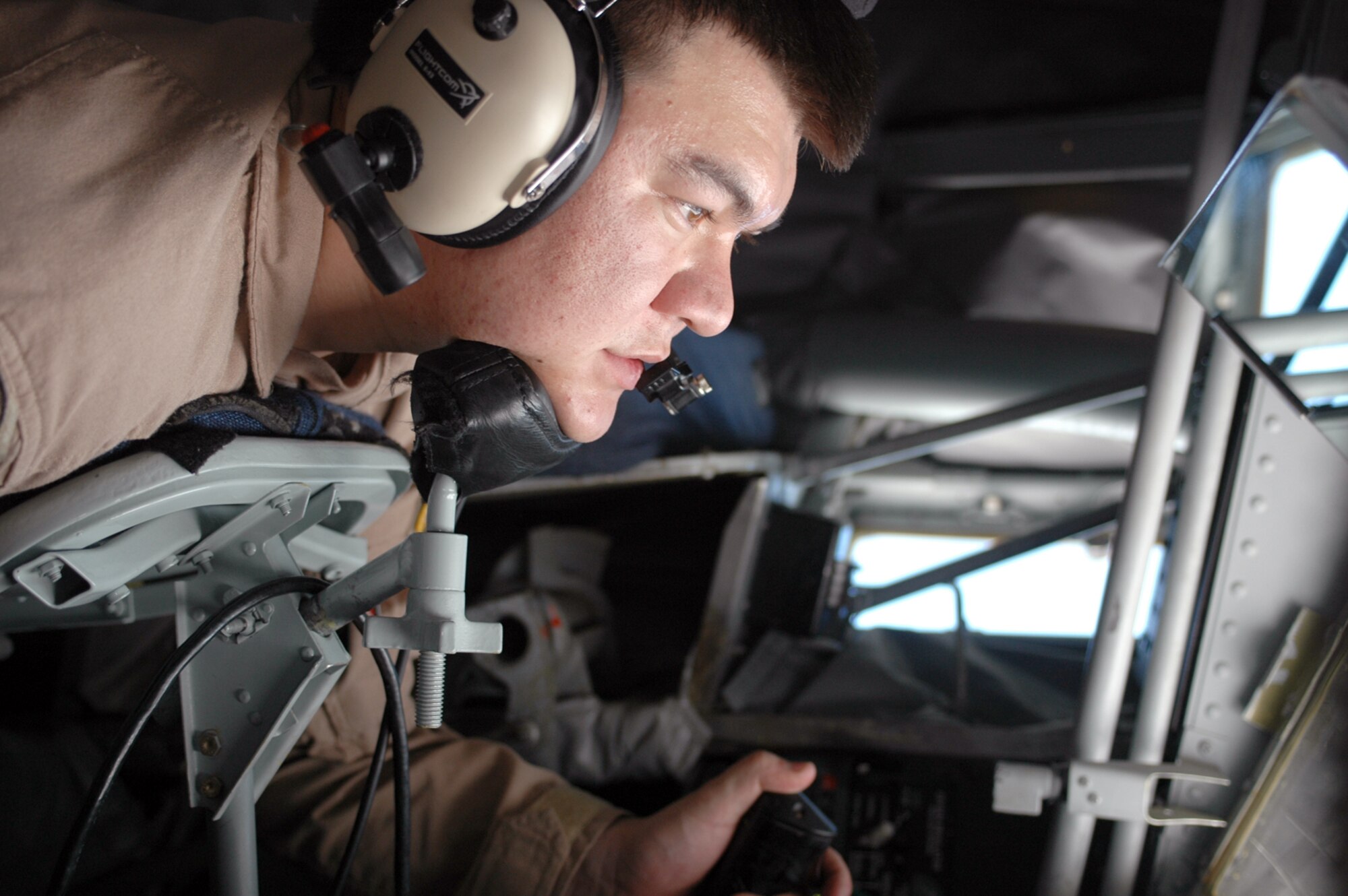 A boom operator with the 340th Expeditionary Air Refueling Squadron prepares to top off an F-16 over Iraq. During the last four months, the squadron has offloaded more than 172,000 million pounds of fuel to more than 13,000 receivers. The 379th Expeditionary Operations Group has  also flown more than 400 intelligence, surveillance and reconnaissance missions.  (U.S. Air Force photo by Senior Airman Erik Hofmeyer)