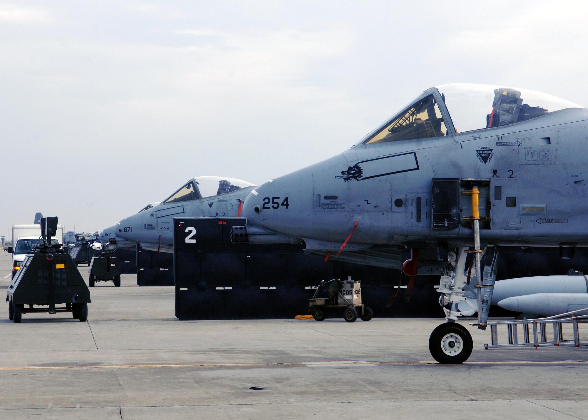 Air Force A-10 Thunderbolt IIs assigned to the 354th Expeditionary Fighter Squadron sits ready to launch at Bagram Airfield, Afghanistan. A-10s fly close air support missions for both Operation Enduring and Iraqi Freedom.  A-10s provided two shows of force over areas in Iraq and Afghanistan Sept. 2.  (U.S. Air Force photo/Staff Sgt. Craig Seals)
