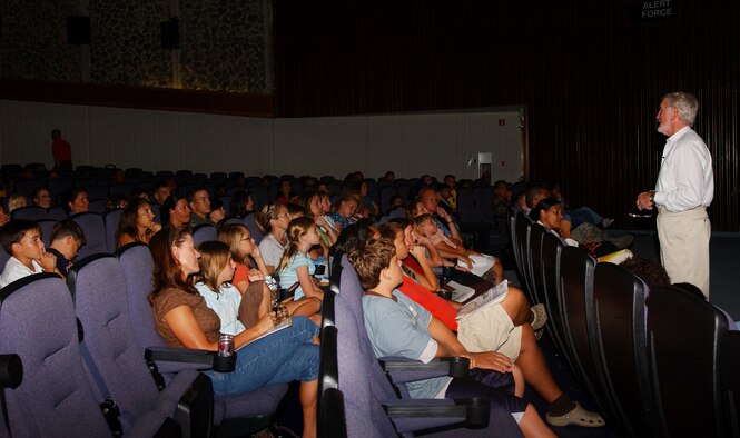 Ken Wooden, renowned speaker and child sexual abuse expert, speaks to families in the Keystone Theater on Kadena Air Base, Japan, Aug. 27, about sexual predators and the lures they use to trap child and young adult victims.  Mr. Wooden travels around the world educating children and their families about being proactive to counter sexual predators.  He has also made a variety of television appearances, including the Oprah Winfrey Show.   (U.S. Air Force photo/Tech. Sgt. Reynaldo Ramon) 