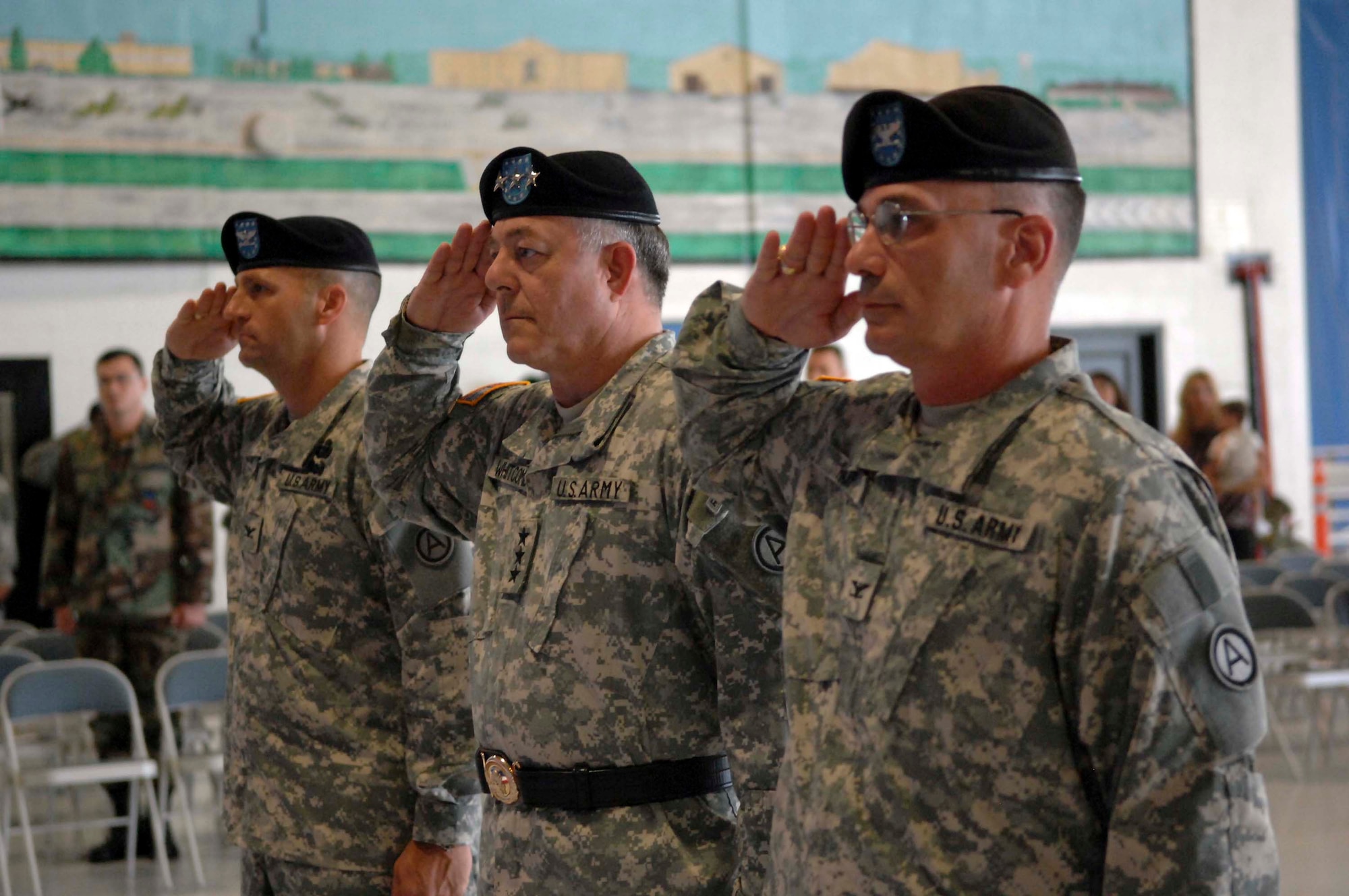 SHAW AIR FORCE BASE, S.C. -- Army Lt. Gen. R. Steven Whitcomb, 3rd Army Commanding General, U.S. Army Central; Army Col. Kevin Felix (left), incoming 4th Battlefield Coordination Detachment commander; and Army Col. Glenn Harp, outgoing 4th BCD commander, salute the colors at the beginning of a change of command ceremony Aug. 29. Created on July 26, 2005, the mission of the 4th BCD is to serve as the liaison between the combined forces land component commander and the combined forces air component commander. The 4th BCD made its first scheduled deployment in August 2006 to Al Udeid Air Base, Qatar, in support of Operation Iraqi Freedom, Operation Enduring Freedom and operations in the Horn of Africa. (U.S. Air Force photo/Airman 1st Class Kathrine McDowell)