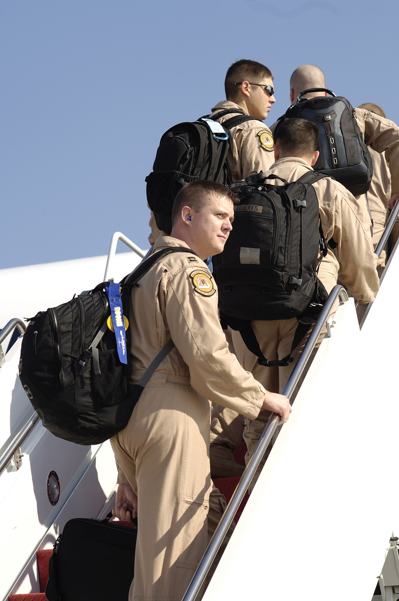 A captain with the 6th Airlift Squadron, McGuire Air Force Base, N.J., looks over the flightline here before departing to Southeast Asia with his squadron in support of the Global War on Terrorism. The captain is part of the Air Force's first single-squadron C-17 deployment. Along with members from other McGuire organizations, they will comprise the 816th Expeditionary Airlift Squadron. (U.S. Air Force photo/Kenn Mann)