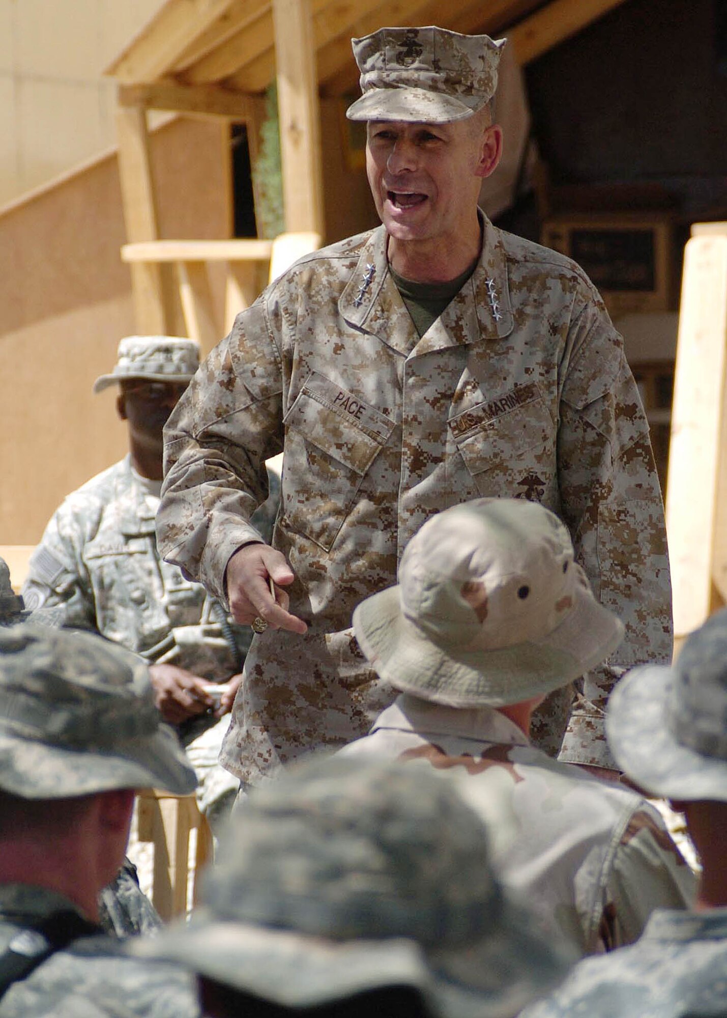 BAGRAM AIRFIELD, Afghanistan -- Marine Gen. Peter Pace, Chairman of the Joint Chiefs of Staff, speaks to Coalition forces members in Ghazni, Afghanistan, September 2, during his final visit to the Operation Enduring Freedom area of operation before his retirement later this month. (U.S. Air Force photo by Senior Airman Dilia DeGrego)