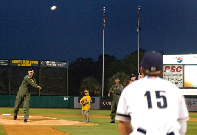 Col. John Millander, 437th Airlift Wing commander, throws one of the first pitches at the RiverDogs game against the Braves on Military Appreciation Night Aug. 31. This game was free to members of Team Charleston and their family members in honor of their service to the United States.(U.S. Air Force Photo/Airman 1st Class Cynthia Spalding)