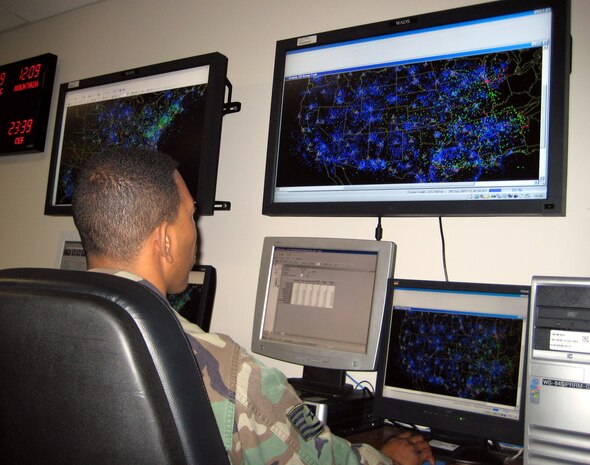 Tech. Sgt. Anthony Church, 84th Radar Evaluation Squadron radar data analyst, analyzes raw radar data recorded over the Sierra Nevada to assist authorities in the rescue efforts for adventurer Steve Fossett Wednesday. (U.S. Air Force photo by Senior Airman Clay Murray)