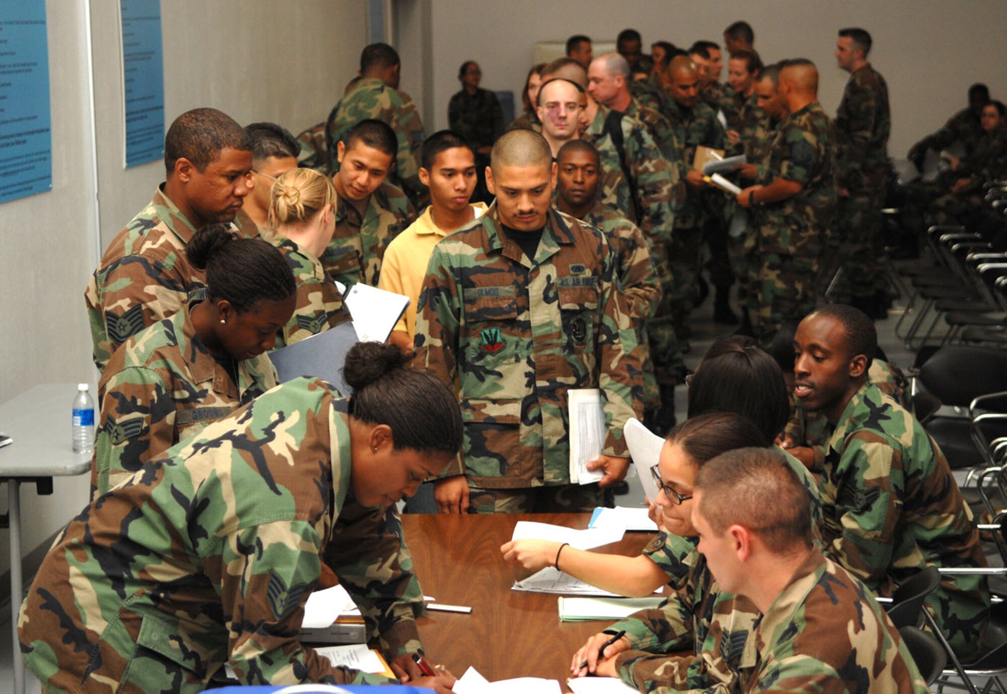 More than 150 Airmen went throught the delpoyment processing line Aug. 24 at Holloman. The processing line is where Airmen ensure they have all the necessary sign-offs completed and can consult with such agencies as Legal, Finance and the Chapel. More than 700 Holloman Airmen are deploying in the upcoming Air and Space Expeditionary Force rotation. (U.S. Air Force photo/Airman 1st Class John Strong)
