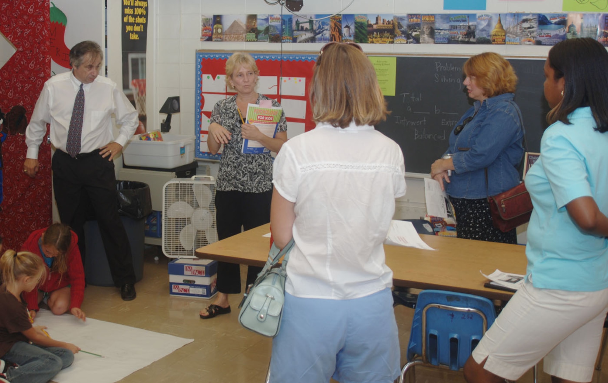 Parents of base children toured Caledonia Elementary, Middle and High schools Aug. 20 to help the make an informed decision on their school choice options at the Caledonia campus. (U.S. Air Force photo by Senior Airman John Parie)
