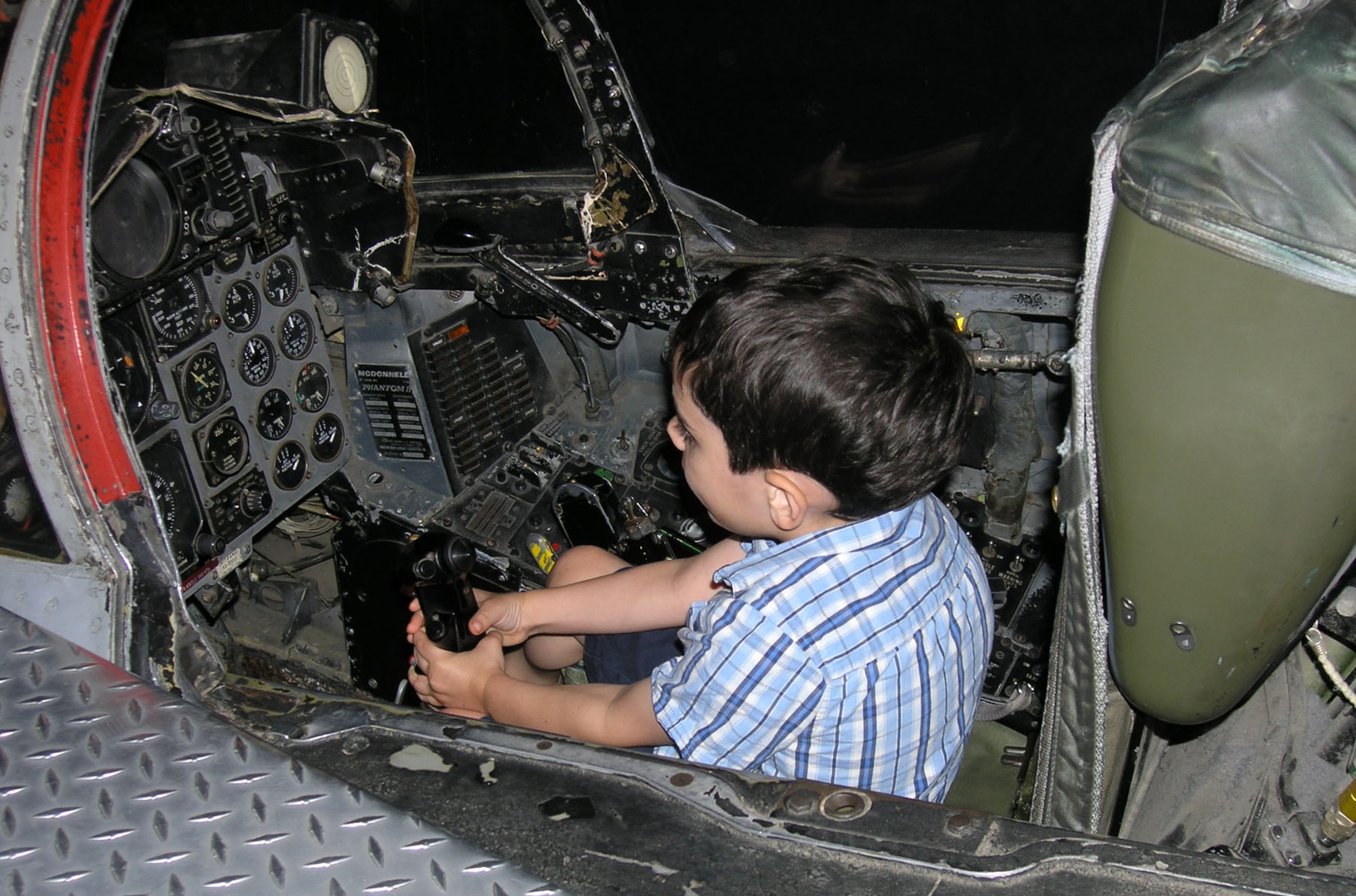 DAYTON, Ohio -- Jerry Hudgins visited the National Museum of the United States Air Force with his 3-year-old grandson Lucas in July 2007. He took this photo of Lucas in the F-4D sit-in cockpit during their visit. (Photo courtesy of Jerry Hudgins)