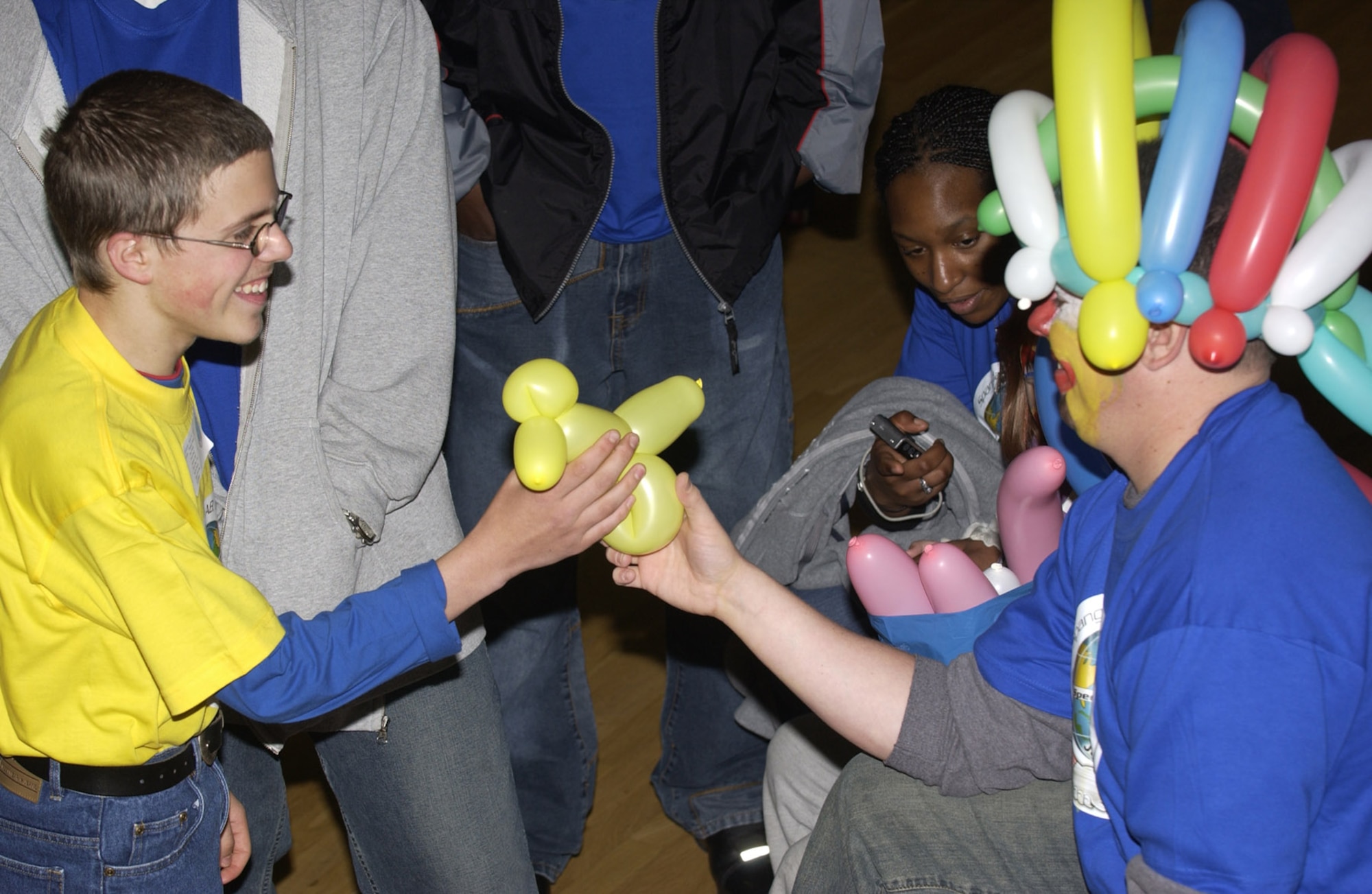 SPANGDAHLEM AIR BASE, Germany – A volunteer at the 2006 St. Martin’s Children’s Day event makes balloon animals for students at St. Martins School in Bitburg and local Department of Defense Dependents schools. The St. Martin’s Special Children’s Day committee needs 225 Sabers volunteers to assist with a full day of sporting events for local special needs students Sept. 20. (Courtesy photo)