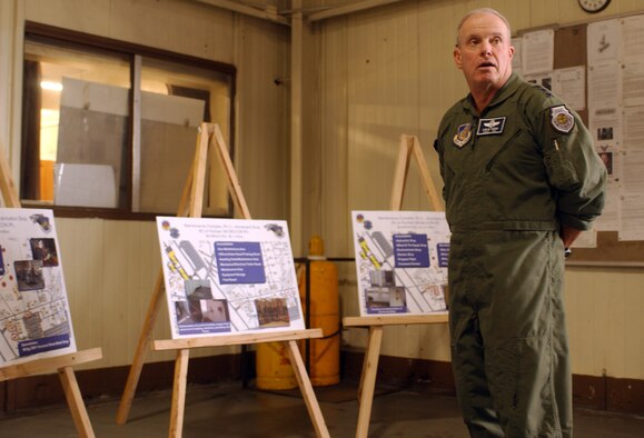 KUNSAN AIR BASE, South Korea -- Lt. Gen. Stephen Wood, 7th Air Force commander, discusses plans for a new maintenance fabrication shop during his visit here Sept. 5.  (U.S. Air Force photo/Senior Airman Steven R. Doty)                            