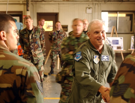 KUNSAN AIR BASE, South Korea -- Lt. Gen. Stephen Wood, 7th Air Force commander, greets Airmen at the metals shop during his visit here Sept. 5.  (U.S. Air Force photo/Senior Airman Steven R. Doty)                               