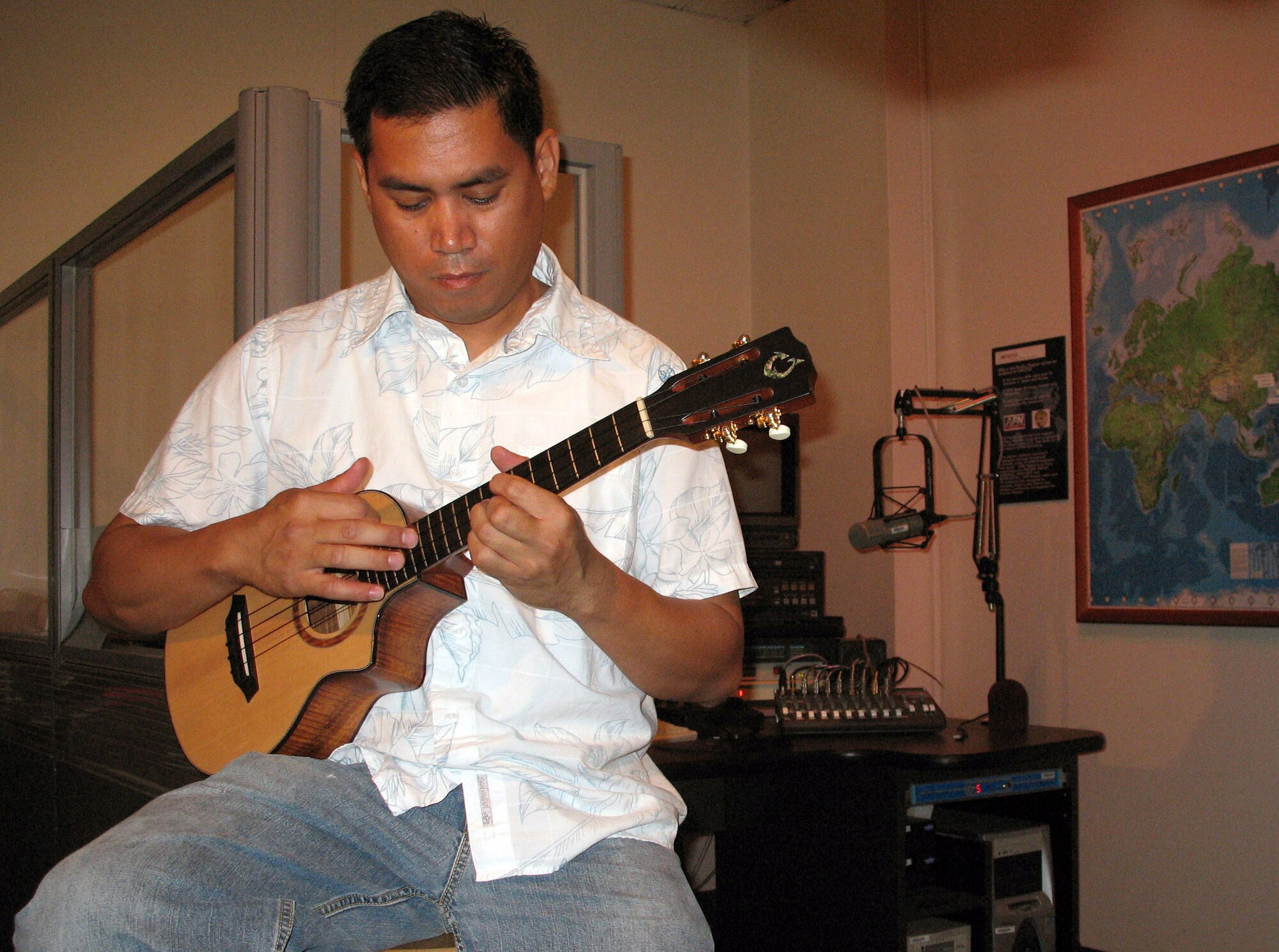 Tech. Sgt. Daniel Baduria plays a ukulele Aug. 31 at Hickam Air Force Base, Hawaii. Sergeant Baduria will open the Tops in Blue show at the Waikiki Shell Sept. 12 as part of Air Force Week Honolulu. (U.S. Air Force photo/Tech. Sgt. Chris Vadnais)
