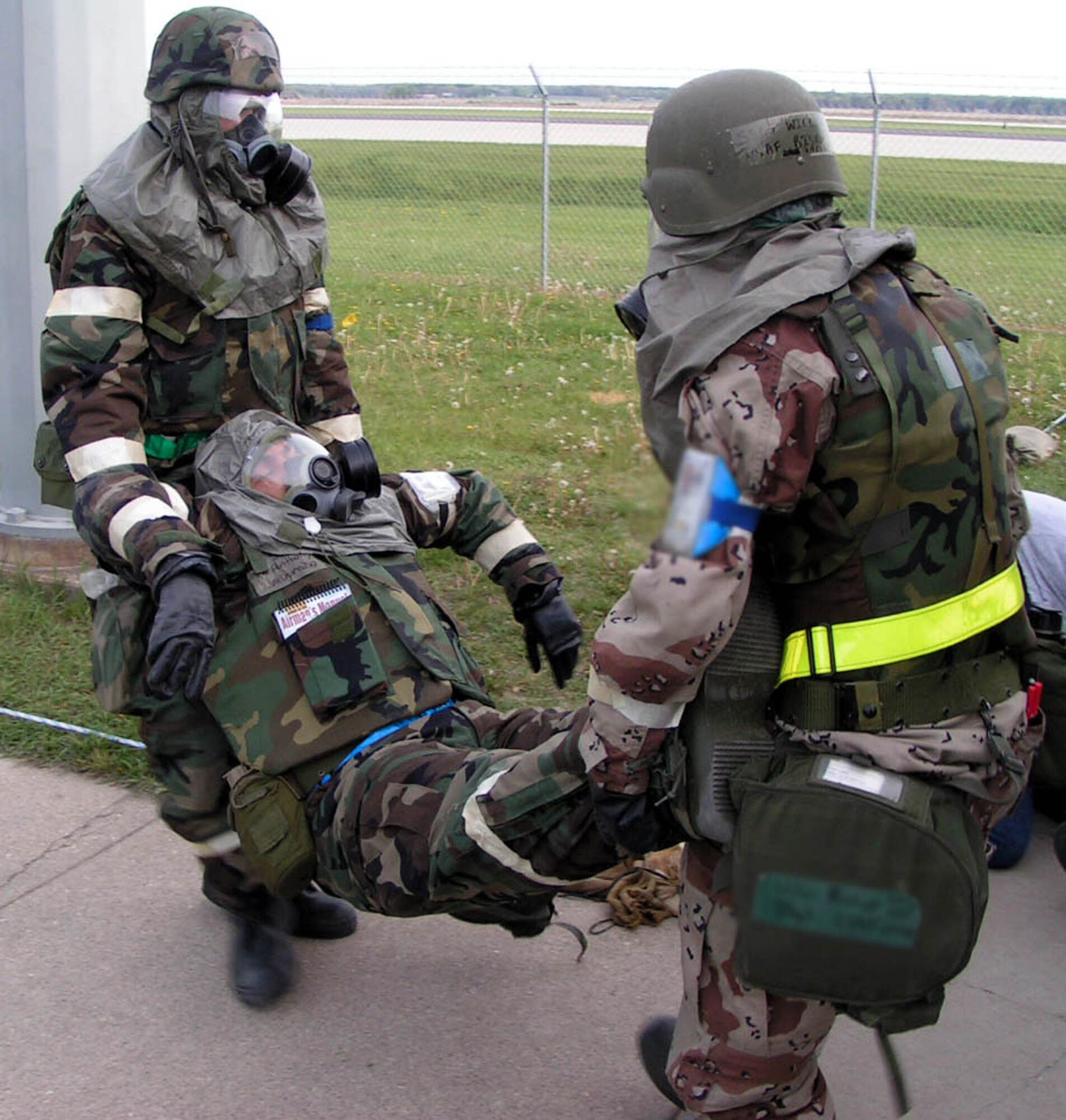 Airmen practice Self Aid and Buddy Care techniques during an exercise. SABC is commonly used by the military in deployed environments where there is a constant threat of serious bodily injury from improvised explosive devices, bombs and mortars. (U.S. Air Force photo)