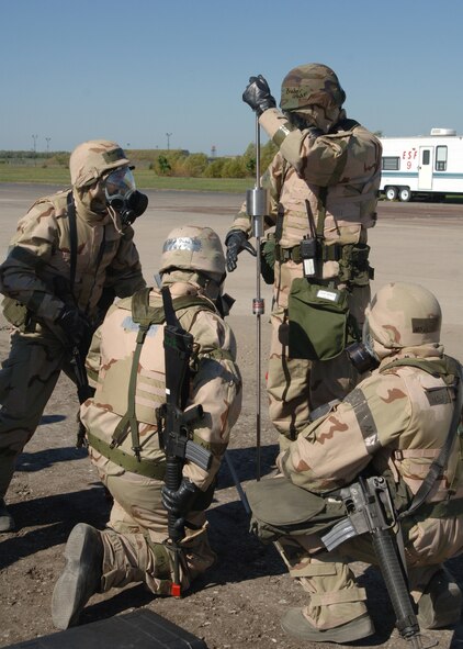 GRAND FORKS AIR FORCE BASE, N.D. -- Master Sgt. Charles Breder, 319th Civil Engineers Squadron, and his crew use Dynamic Cone Pintrometer to measure the density of a filled in hole during thier exercise to train for Silver Flag in Fargo, N.D., August 30, 2007. The Squadron was tested on its war time mission and its abilitiy to adapt to unpredictable scenarios such as Rapid Runway Repair in Mission Oriented Protective Posture 4. (photo/Airman 1st Class Chad Kellum) 