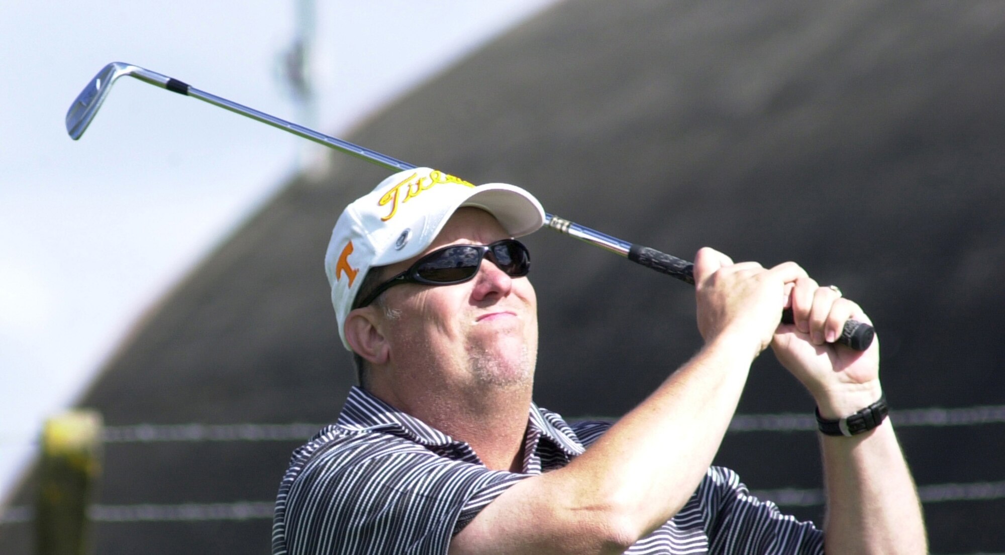 Nine handicapper Bill Sachse, plays a short iron tee shot into the 13th green for the 100th Logistics Readiness Squadron, during the intramural golf championships at Breckland Pines Golf Club, Sept. 4. (U.S. Air Force photo by Gary Rogers)