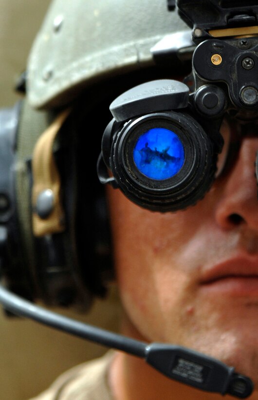 070907-N-5169H-130, HADITHA DAM, Iraq, (Sept. 16, 2007) – A sailor with Riverine Squadron 1, Riverine Group 1, Navy Expeditionary Combat Command, in support of Regimental Combat Team 2, does an operational check on his night-vision goggles before setting off on a night patrol through Iraq’s waterways. As the first deployed Navy riverine unit since the Vietnam War, the squadron had the responsibility to not only accomplish the mission, but to also pave the way for future riverine forces. U.S. Navy photo by MC2 Marcos T. Hernandez (RELEASED)::n::