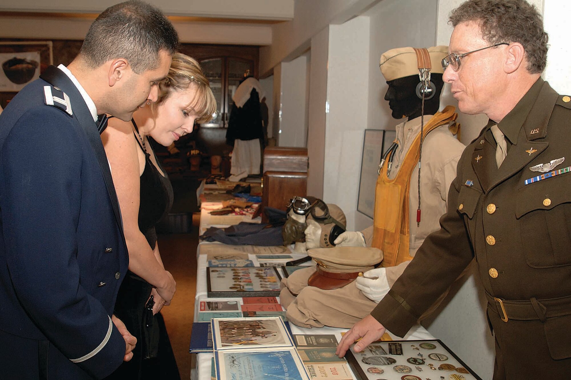Uniforms, photos and memorabilia from past wars were displayed at the 2006 Air Force Ball by members of a 45th Infantry Division Museum-designated organization. The organization will return for this year's ball to display more historical military artifacts. (Air Force photo by Margo Wright)