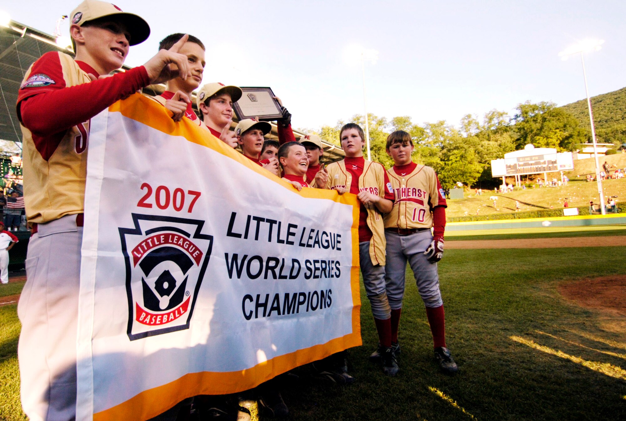 Players on the Warner Robins American Little League team hold up their Little League World Series Championship flag after their 3-2 win over Japan Aug. 26. (Courtesy photo/Jason Vorhees)
