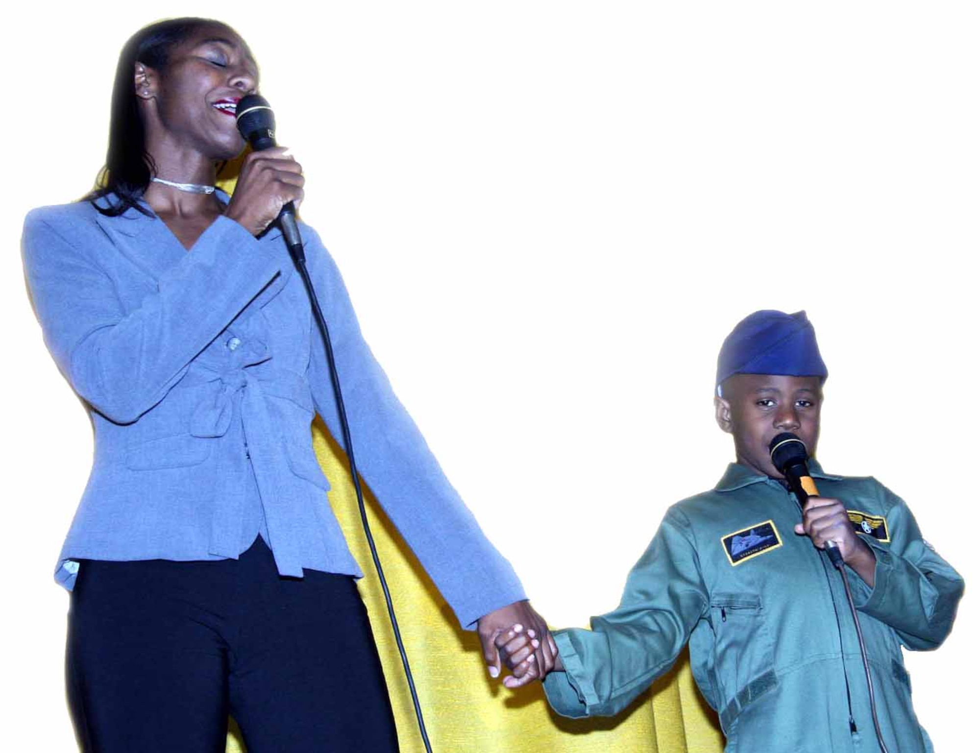 Nekia and Adama Mbaye took first place in the parent and youth category of last year’s Family and Teen Talent Contest with their version of “I Believe I Can Fly.” (Air Force photo by Becky Pillifant)