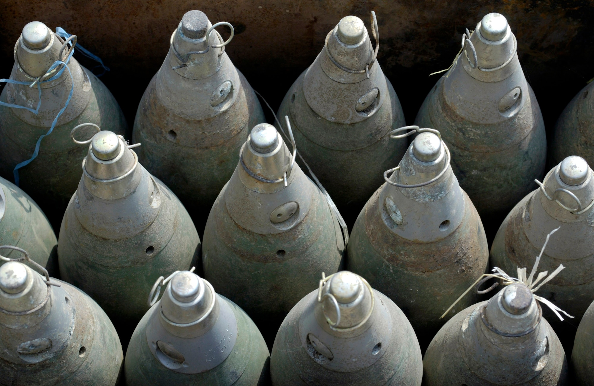 Munitions are ready for a controlled detonation conducted by Air Force explosive ordnance disposal specialists Sept. 1 at Forward Operating Base Mehtar Lam in Afghanistan's Laghman Province. Nearly 900 pounds of small arms ammunition, rocket-propelled grenades and mortars were turned in by provincial citizens. (U.S. Air Force photo/Master Sgt. Jim Varhegyi)
