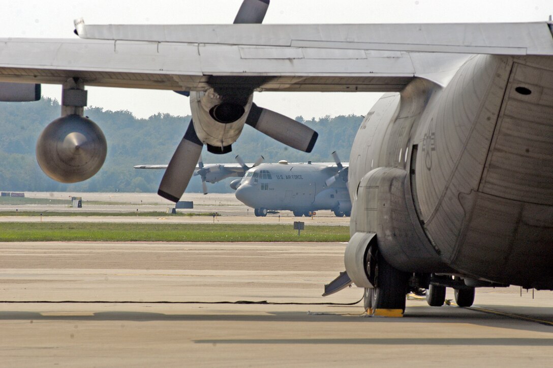 PITTSBURGH AIR RESERVE STATION, PA -- The 911th Airlift Wing recieves a C-130H2 from the Oklahoma National Air National Guard Sep. 6, 2007. Col. Mike McCormack, 137th Airlift Wing Commander, flew and delivered the aircraft, traveling from Will Rogers ANG Base to Pittsburgh ARS. The plane had been in the 137th's inventory since it rolled off of the assembly line in 1979. This was Col. McCormack's final landing as a C-130 pilot. (USAF photo by Staff Sgt. Ian Carrier)                                