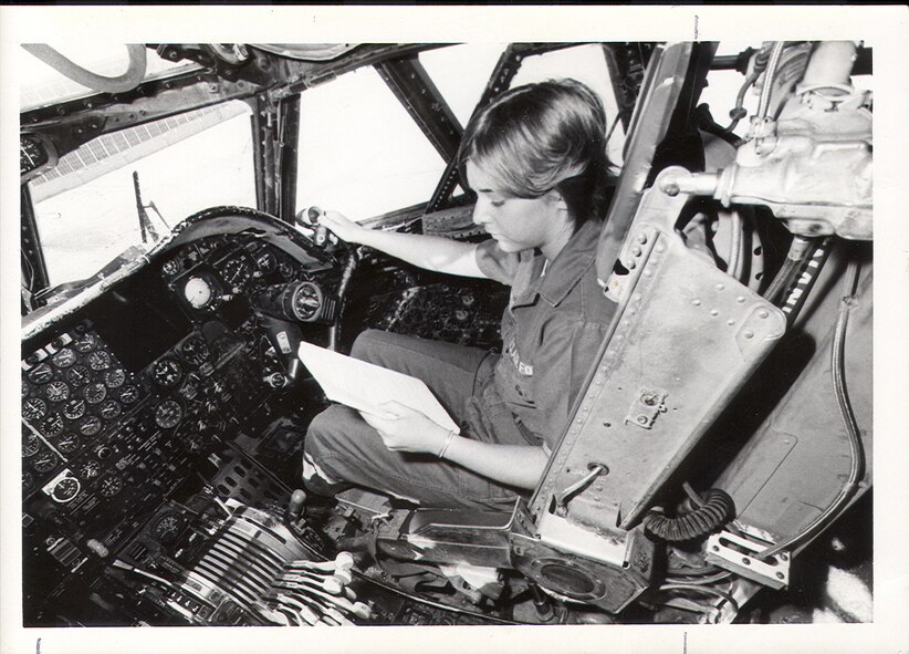 Then Airman Eileen Berning performs a check in a KC-135 Stratotanker in the 1970s. (Courtesy photo)
