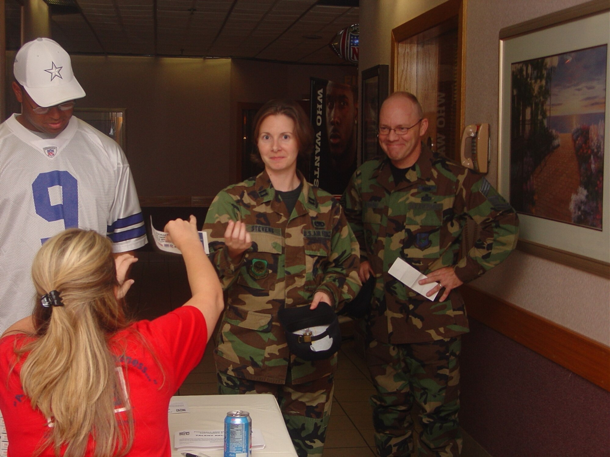 Hundreds of Team McGuire members participate in the kickoff of the NFL season at the McGuire Club. The USO and NFL provided food, football and prizes in appreciation for our military members.  
