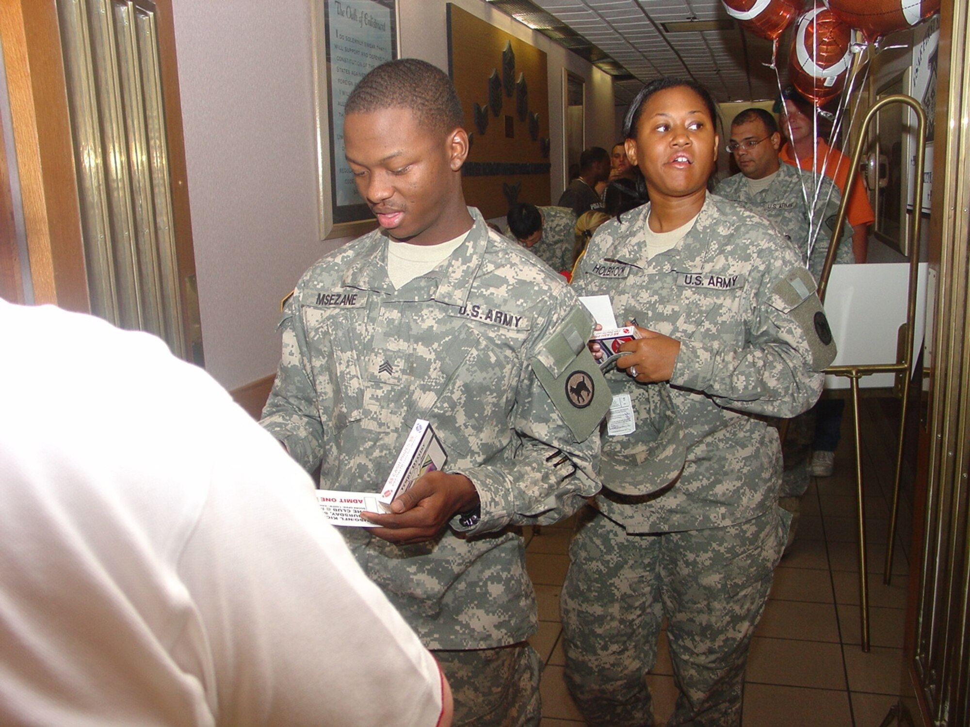 Hundreds of Team McGuire members participate in the kickoff of the NFL season at the McGuire Club. The USO and NFL provided food, football and prizes in appreciation for our military members.  