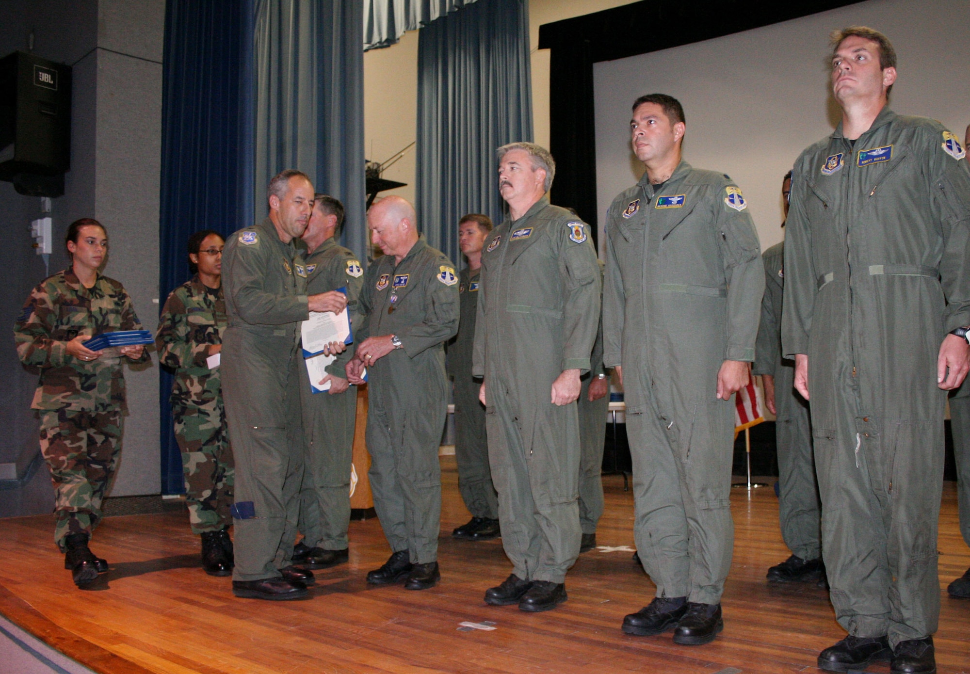 PATRICK AIR FORCE BASE, Fla. -- Thirty-two Air Force Reservists from the 920th Rescue Wing were awarded the Air Medal for their outstanding performance during Hurricane Katrina rescue operations at a ceremony held in the base theater here today. The Air Medal is awarded to servicemembers who have distinguished themselves by meritorious achievement while participating in aerial flight. Awards recognize single acts of merit, heroism or meritorious service. (U.S. Air Force photo/Staff Sgt. Paul Flipse) 