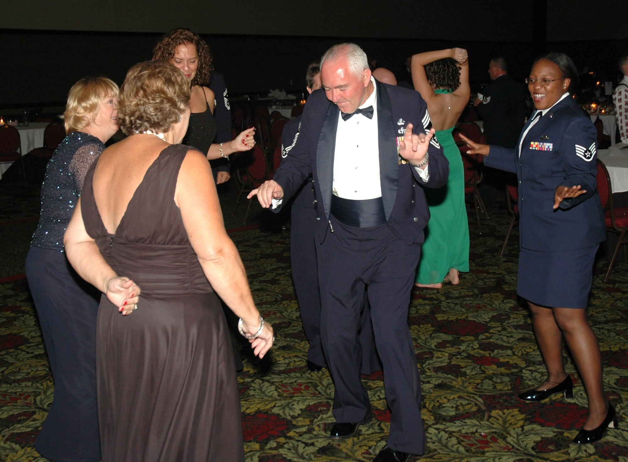 Chief Master Sgt. Charlie Hall, 81st Aerial Port Squadron, enjoys himself on the dance floor at the 2007 Air Force Ball.  The 2007 Air Force Ball at Charleston AFB, S.C. celebrated the 60th anniversary of the Air Force and was attended by over 1,000 people.  (Photo by Senior Airman Dani Pacheco, USAFR)