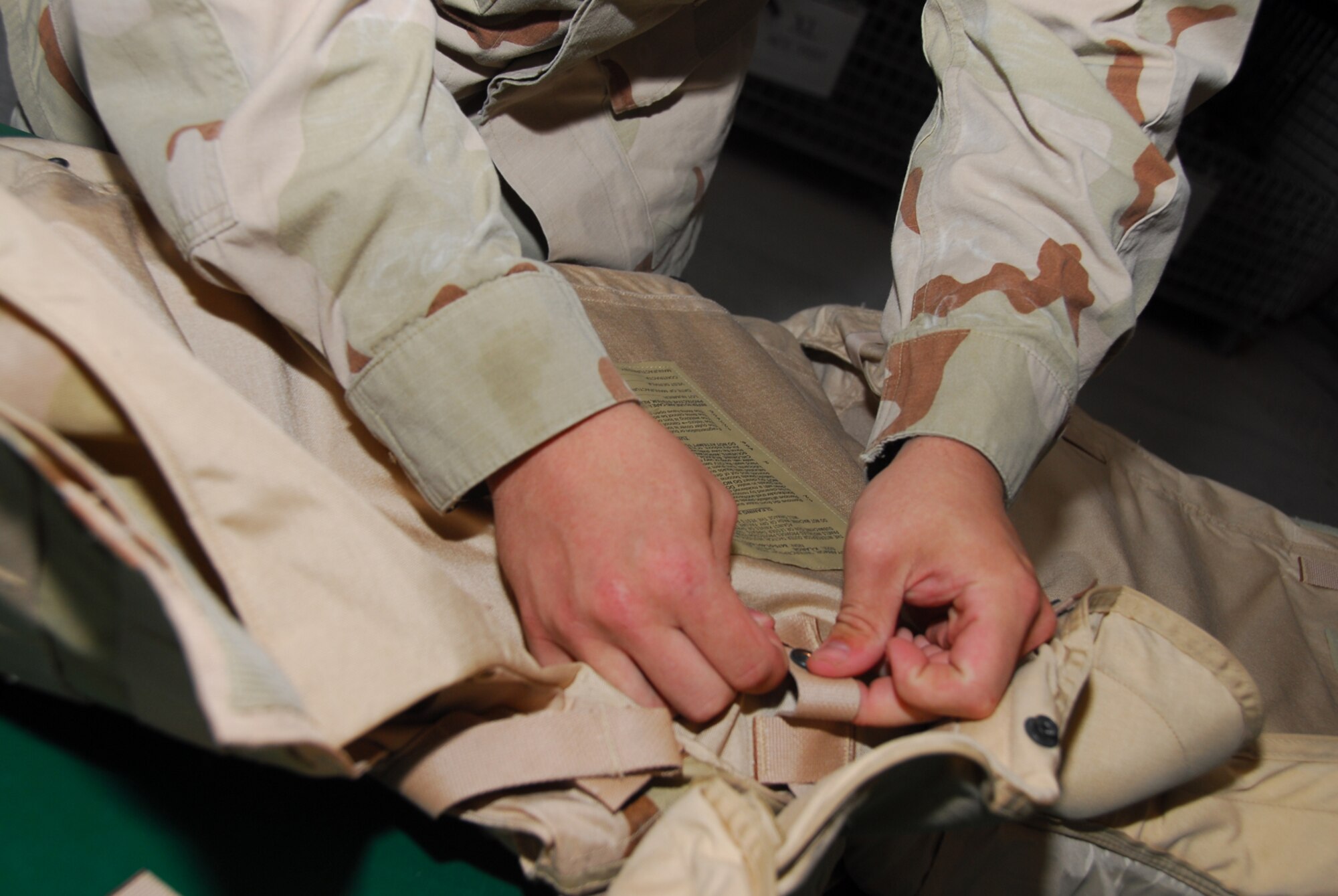 The 379th Expeditionary Logistics Readiness Squadron’s Expeditionary Theater Distribution Center is the primary source of mobility gear for all personnel  headed into other areas in theater, including A, B and C bags, body armor, first aid kits and weapons.  (U.S. Air Force photo by Airman 1st Class Ashley Tyler)