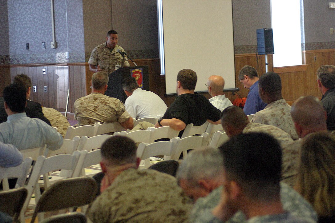 MARINE CORPS BASE CAMP LEJEUNE, N.C. (Sept. 10, 2007)- Lt. Col. Dave Barnes, the officer in charge of the Transition Team Cell, II Marine Expeditionary Force Headquarters Group, II MEF, speaks to Marines, soldiers, sailors and civilian and government scientist about missions, roles and capability needs of transition teams in Iraq during the II MEF Science and Technology conference at Marston Pavilion here Sept. 10. (Official U.S. Marine Corps photo by Cpl. Lucian Friel (RELEASED)
