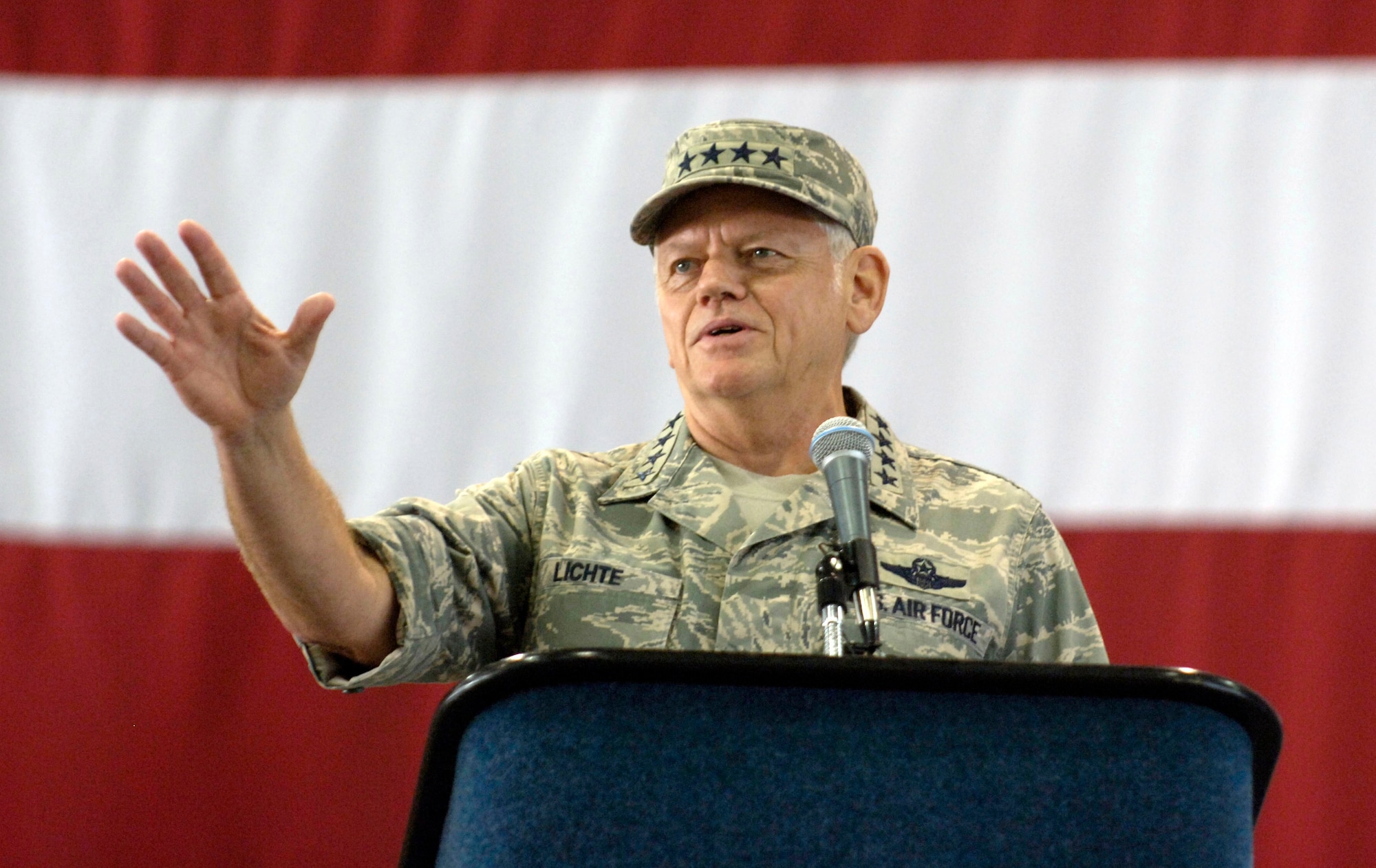 Gen. Arthur J. Lichte addresses attendees at his assumption of command ceremony as the Air Mobility Command commander Sept. 7 at Scott Air Force Base, Ill. (U.S. Air Force photo/Staff Sgt. Tony Tolley)
