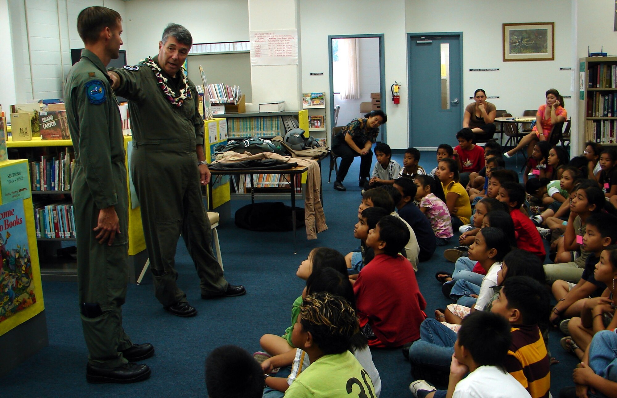 Gen. Paul V. Hester, Commander of Pacific Air Forces, speaks to a group of fourth and fifth grade students at Kalihi Elementary School Monday in support of Airmen in Education day.  The event, part of Air Force Week Honolulu, included over 800 Airmen volunteers visiting approximately 80 schools on Oahu.