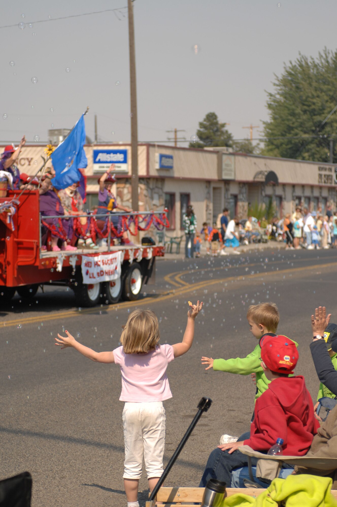 MOUNTAIN HOME AIR FORCE BASE, Idaho -- Gunfighters and members of the local community watch as the Air Force Appreciation Day parade passes through downtown Mountain Home Sept. 8. Participants honored the Air Force throughout the day beginning with the parade and ending with a booth fair at Carl Miller Park. With the Air Force’s anniversary on Sept. 18, Airmen here along with community members will celebrate again at the Air Force heritage day celebration Aug. 14. People can access the base through the Grandview entrance starting at noon with the celebration officially kicking off at 1:30 p.m. (U.S. Air Force photo/Airman 1st Class Ryan Crane)