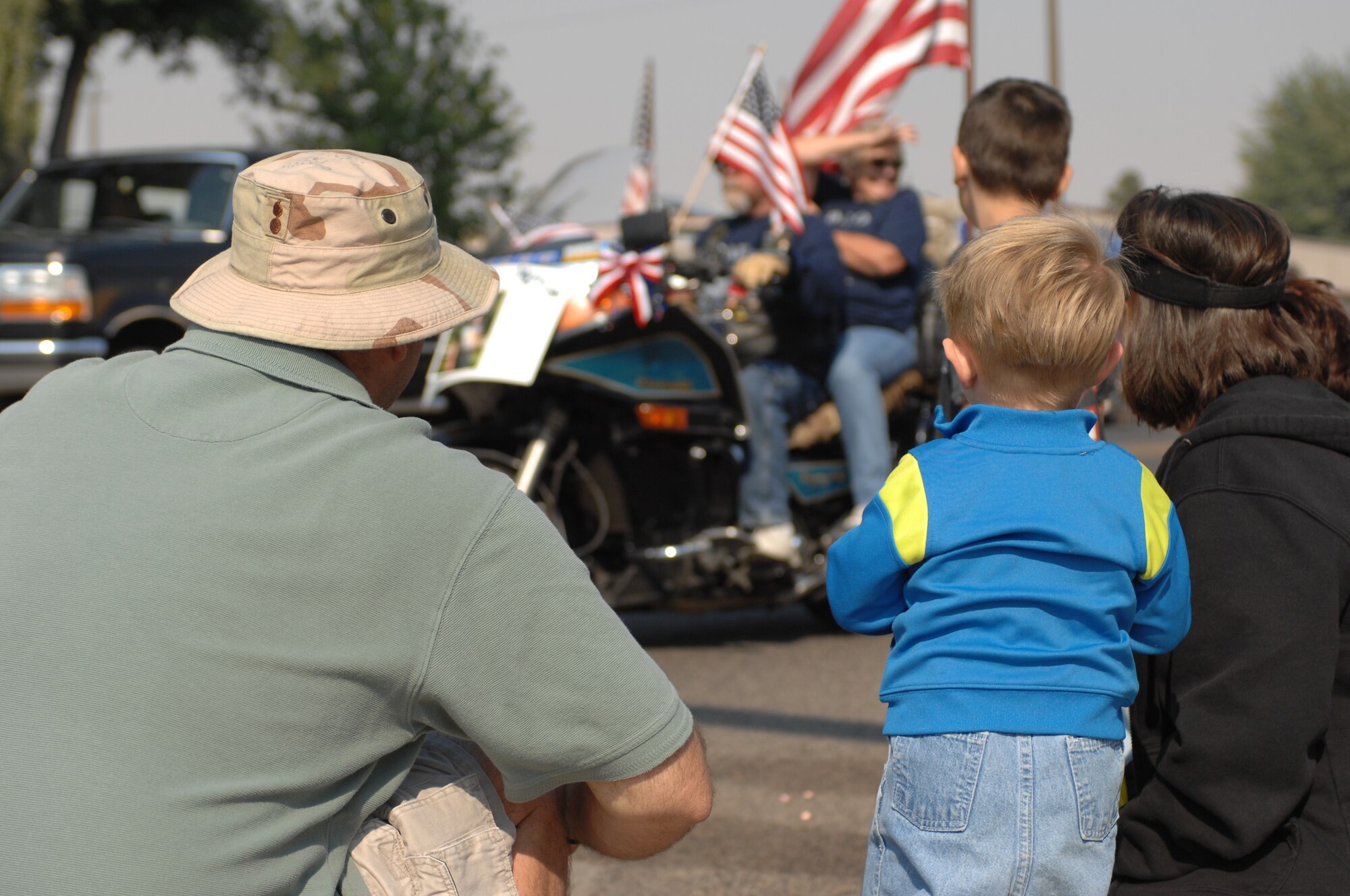 MOUNTAIN HOME AIR FORCE BASE, Idaho -- Gunfighters and members of the local community watch as the Air Force Appreciation Day parade passes through downtown Mountain Home Sept. 8. Participants honored the Air Force throughout the day beginning with the parade and ending with a booth fair at Carl Miller Park. With the Air Force’s anniversary on Sept. 18, Airmen here along with community members will celebrate again at the Air Force heritage day celebration Aug. 14. People can access the base through the Grandview entrance starting at noon with the celebration officially kicking off at 1:30 p.m. (U.S. Air Force photo/Airman 1st Class Ryan Crane)