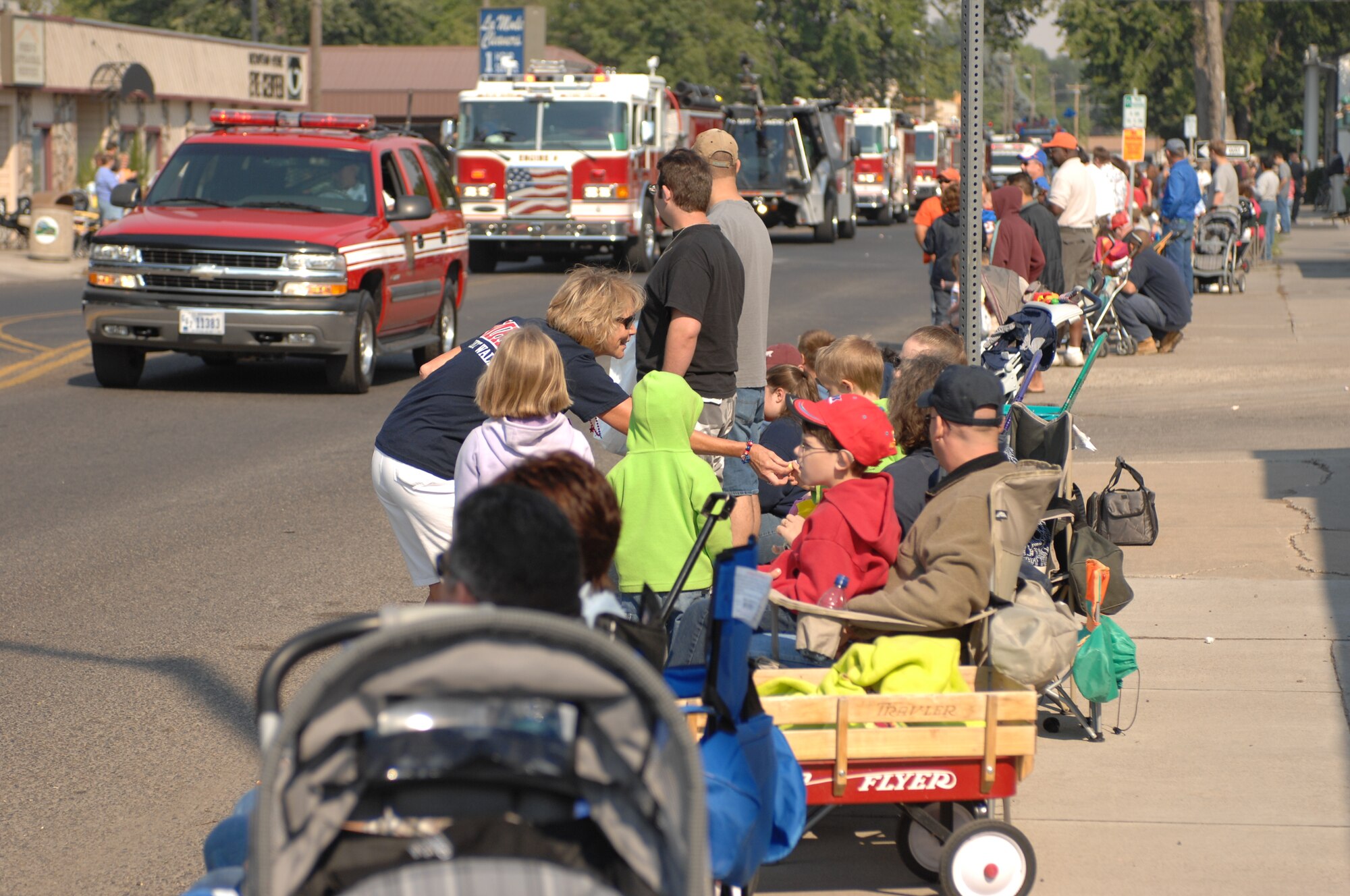 MOUNTAIN HOME AIR FORCE BASE, Idaho -- Gunfighters and members of the local community watch as the Air Force Appreciation Day parade passes through downtown Mountain Home Sept. 8. Participants honored the Air Force throughout the day beginning with the parade and ending with a booth fair at Carl Miller Park. With the Air Force’s anniversary on Sept. 18, Airmen here along with community members will celebrate again at the Air Force heritage day celebration Aug. 14. People can access the base through the Grandview entrance starting at noon with the celebration officially kicking off at 1:30 p.m. (U.S. Air Force photo/Airman 1st Class Ryan Crane)