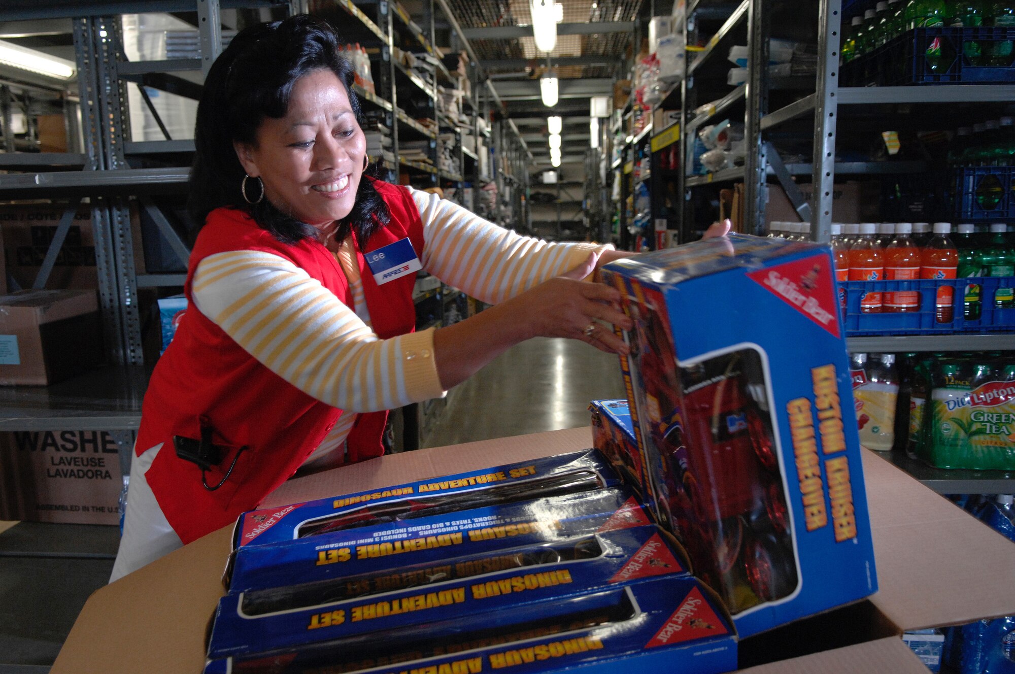 Lee Stevens, an Army & Air Force Exchange Service (AAFES) employee, boxes up toys prior to shipment at Ellsworth Air Force Base, S.D., Sept. 06, 2007.  These toys are just a few of the 13,000 Soldier Bear brand toy sets that are being recalled by AAFES stores due to high levels of lead in the surface paints.  (U.S. Air Force photo by SSgt Michael B. Keller)