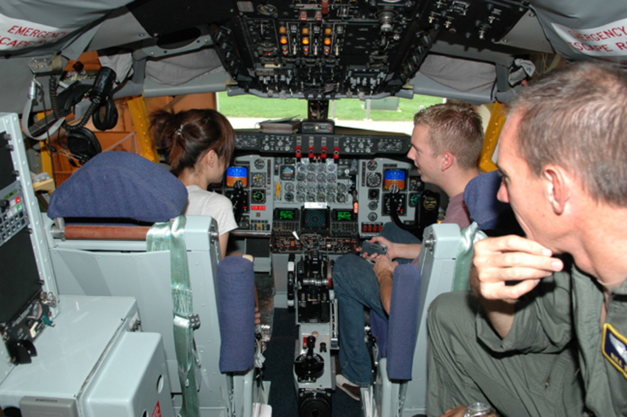 GRISSOM AIR RESERVE BASE, Ind., -- Young visitors receive a first-hand look at the inside of a KC-135R Stratotanker during family day activities.  Major Bill Werth, a KC-135R pilot, was on hand to answer questions.  The tour of the KC-135R was just one of a number of activities available during the 434th Air Refueling Wing's annual family day.  (U.S. Air Force photo/Senior Airman Chris Bolen)
