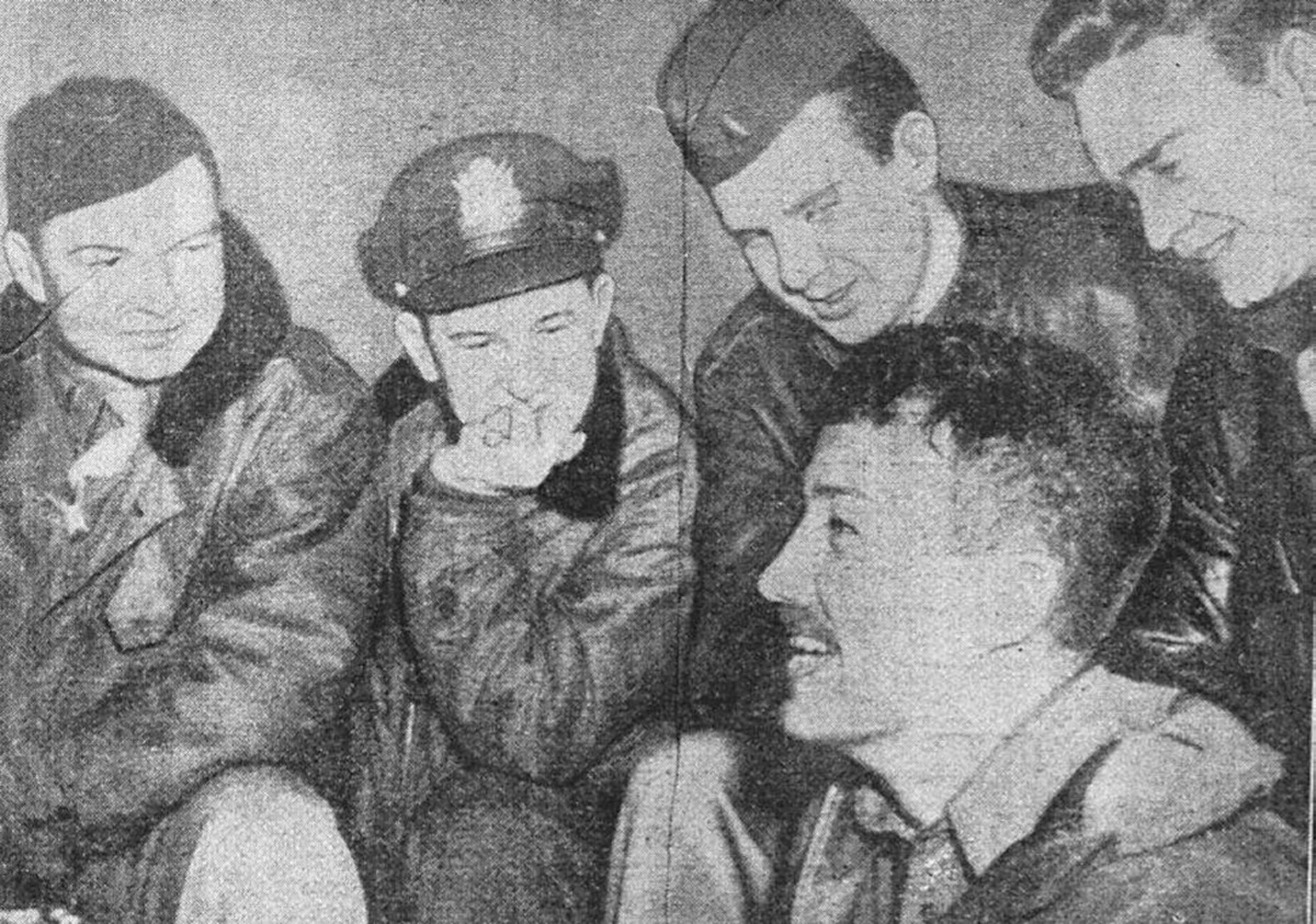 EIELSON AIR FORCE BASE, Alaska--A photo from a local Alaskan newspaper after 2nd Lt. Leon Crane (front) was rescued from spending 86 days in the wilderness. Lieutenant Crane was the B-24 co-pilot when the aircraft crashed about 120 miles east of Fairbanks, he survived in the wilderness after he stumbled upon trapper's cabins where he found food and refuge from the elements. Crew chief Master Sgt. Richard Pompeo, the second man who made it out of the bomber, was never found. (file photo)