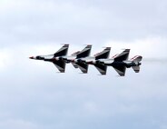MINOT AIR FORCE BASE, N.D. -- The U.S. Air Force Thunderbirds perform a "trail to diamond loop" during Northern Neighbor’s Day here Sept. 8. Inclement weather cleared up just in time for the Thunderbirds to perform, to the delight of many people waiting to see the Air Force’s premier aerial demonstration team. The Thunderbirds perform precision aerial maneuvers to exhibit the capabilities of modern high-performance aircraft to people throughout the world. The pilots performed approximately 40 maneuvers during the demonstration. (U.S. Air Force photo by Senior Airman Christopher Boitz)