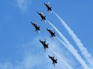 MINOT AIR FORCE BASE, N.D. -- The U.S. Air Force Thunderbirds perform a flight demonstration during Northern Neighbor’s Day here Sept. 8. Inclement weather cleared up just in time for the Thunderbirds to perform, to the delight of many people waiting to see the Air Force’s premier aerial demonstration team. The Thunderbirds perform precision aerial maneuvers to exhibit the capabilities of modern high-performance aircraft to people throughout the world. The pilots performed approximately 40 maneuvers during the demonstration. (U.S. Air Force photo by Senior Airman Christopher Boitz)