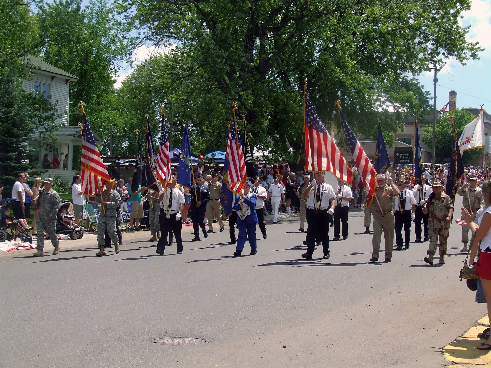 A color guard carrying the American flag starts the Independence Day parade July 4, 2007, on the main street of Wakefield, Mich.  (U.S. Air Force Photo/Tech. Sgt. Scott T. Sturkol)