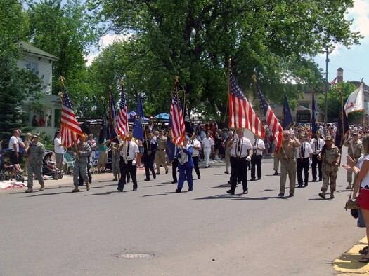 A color guard carrying the American flag starts the Independence Day parade July 4, 2007, on the main street of Wakefield, Mich.  (U.S. Air Force Photo/Tech. Sgt. Scott T. Sturkol)