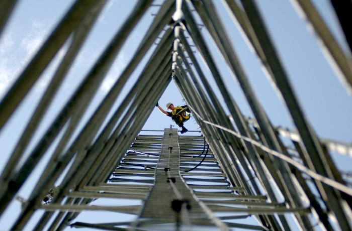 Staff Sgt. William Hoover, 437th Communications Squadron ground radio maintainer, evaluates the line of site for a new security system to be used by security forces on a 150-foot tower Sept. 7 on Charleston AFB.   (U.S. Air Force photo/Airman 1st Class Nicholas Pilch) 
