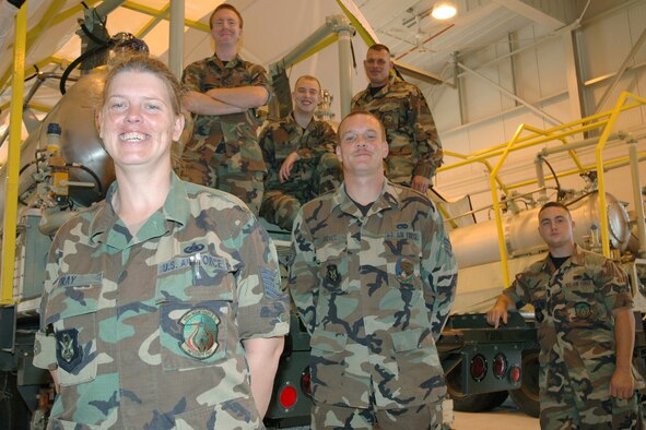 YOUNGSTOWN AIR RESERVE STATION, Ohio — Air Force Reserve Tech. Sgt. Shannon K. Fray leads the first nine Traditional Reservists assigned to the Aerial Spray Maintenance team since it became part of the 910th in 1992. With her are Aerial Spray maintainers Senior Airmen Greg Spencer and Greg Skripsky, Staff Sergeants Gerald K. Groves and Chris Bartels, and Senior Airman Jason Scriven (not pictured: Staff Sgt. Mark Margroff, and Senior Airmen Cathryn Rock and Patrick First). All nine of these TRs previously worked on the flightline here. (U.S. Air Force photo/Senior Airman Ann W. Jefferson)