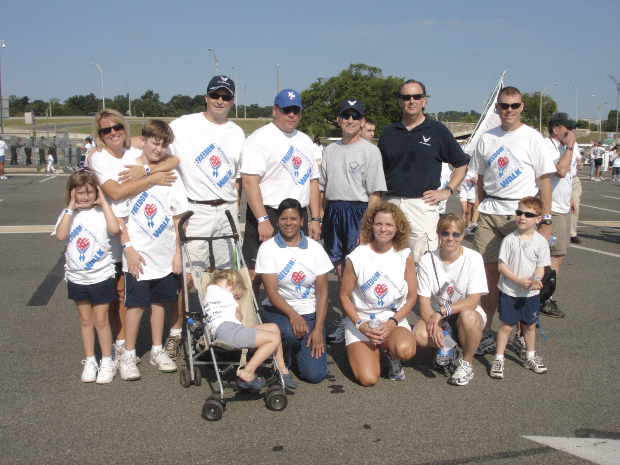 Mr. Bill Anderson, Assistant Secretary of the Air Force for Installations, Environment, and Logistics (back row, second from right), and members of his directorate and their families, joined hundreds of other participants September 9th in the third annual Washington, D.C. National America Supports You Freedom Walk.  Led by friends and families of the September 11th terrorist attack victims, the walk commemorated the victims of 9/11 and honored military veterans, past and present.  The Walk proceeded from the Lincoln Memorial, to the Memorial Circle, and concluded at the Pentagon near the impact site and future home of the Pentagon Memorial.