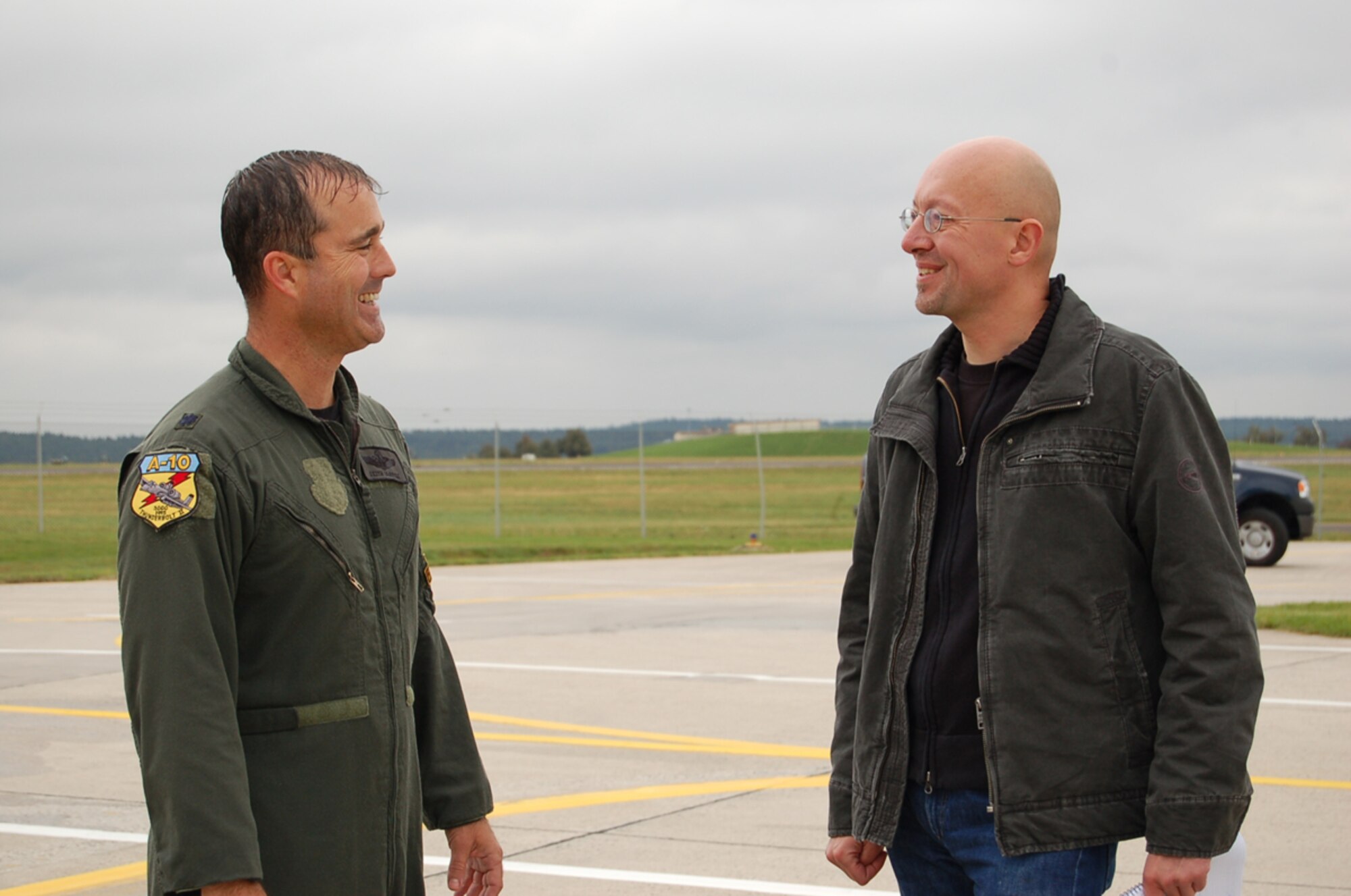 SPANGDAHLEM AIR BASE, Germany – Lt. Col. Keith McBride, who completed 3,000 flying hours in the A/OA-10 fighter aircraft, conducted an interview about his flying accomplishment with German journalist Christian Gerard Sept. 6. The colonel relinquished command of the 81st Fighter Squadron Sept. 7 and will temporarily stay onboard here working for the wing commander’s Air Force Smart Operations for the 21st Century program. (U.S. Air Force photo/Staff Sgt. Andrea Knudson)