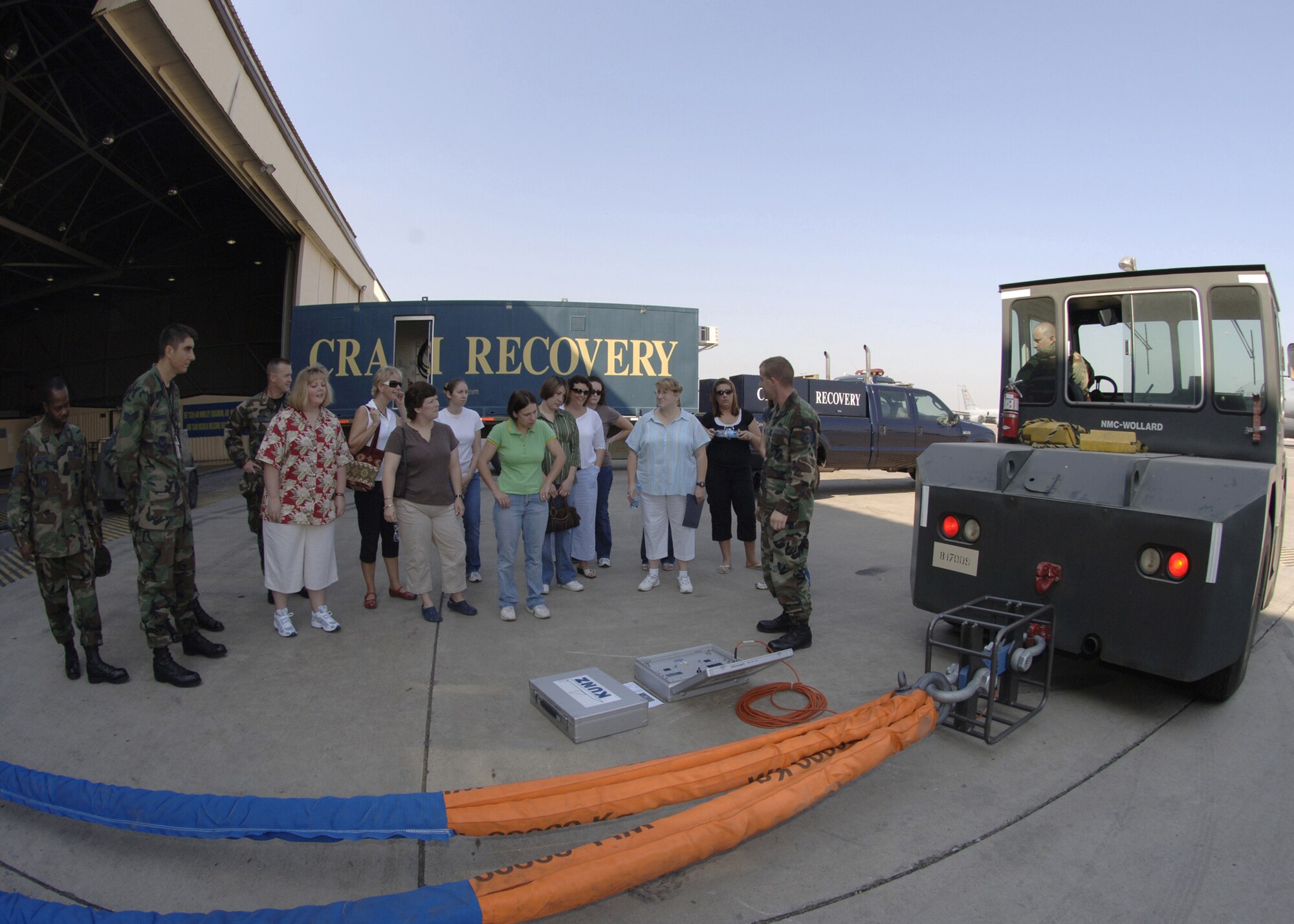 Staff Sergeant Zacharia Myers, 39th Maintenance Squadron, shows the spouses of 39th MXS Airmen how they would handle a crash recovery event. The tour, which was Aug. 30, gave the spouses' an opportunity to learn different aspects of the 39th MXS and ask questions during the various briefings. (U.S. Air Force photo by Senior Airman Tiffany Colburn)(RELEASED)