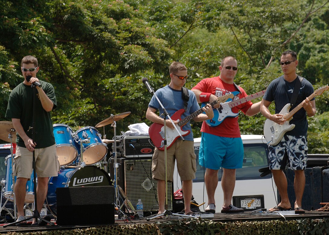ANDERSEN AIR FORCE BASE, Guam - The Fireballs, a band composed of Airmen from the 522nd Expeditionary Fighter Squadron who are deployed from Cannon AFB, N.M., perform for a live audience at Ypao Beach on Sept. 8, 2007. The event was one of many held during Guam's Air Force week to honor the Air Force's 60th Anniversary. (USAF Photo by Senior Airman Sonya Padilla/36th Wing Public Affairs)